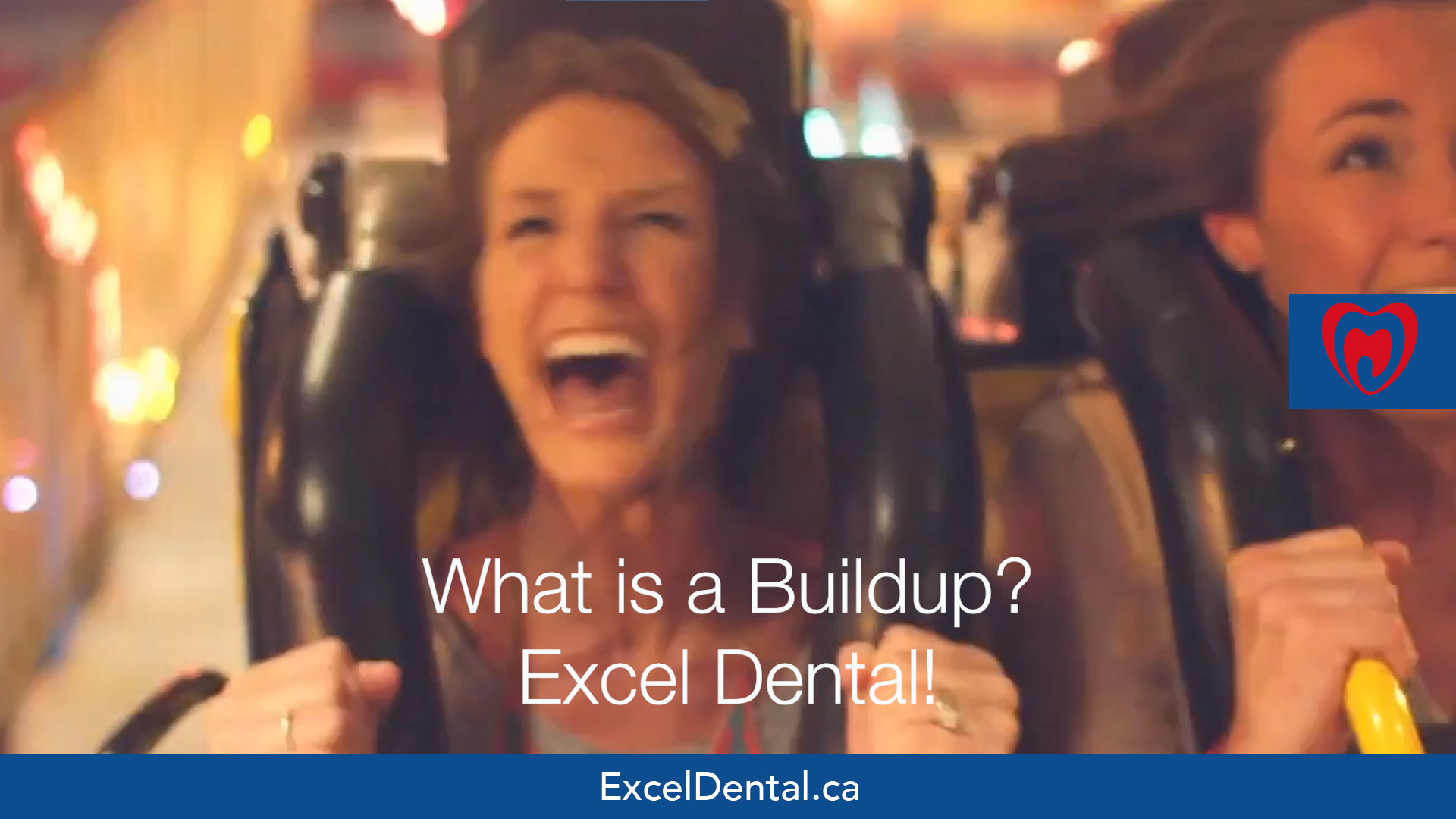 Promotional still of two women laughing on an amusement ride with overlaid text about dental buildup and Excel Dental.
