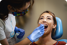 Patient receiving cosmetic dental care